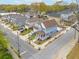 Charming street showcasing craftsman-style homes with well-maintained lawns and sidewalks for pedestrian-friendly neighborhood living at 510 James P. Brawley Dr. Nw Dr, Atlanta, GA 30318