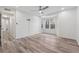 Large bedroom with ceiling fan, hardwood floors and bay window at 554 Mcgill Ne Pl, Atlanta, GA 30312