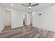 Large bright bedroom with ceiling fan and hardwood floors at 554 Mcgill Ne Pl, Atlanta, GA 30312