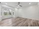 Spacious bedroom featuring hardwood floors and a bay window at 554 Mcgill Ne Pl, Atlanta, GA 30312