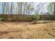 A large, fenced backyard in a residential area at 5175 Walker Rd, Stone Mountain, GA 30088