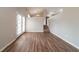 Inviting living room featuring hardwood floors, neutral paint, and staircase to second level at 5175 Walker Rd, Stone Mountain, GA 30088