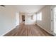 Living room with hard wood floors, a door, and a window at 5175 Walker Rd, Stone Mountain, GA 30088