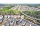 Expansive aerial view of a neighborhood with lush greenery and well-maintained homes at 6585 Creekview Cir, Duluth, GA 30097