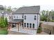 Backyard showcasing a covered patio; perfect for enjoying outdoor living at 6585 Creekview Cir, Duluth, GA 30097