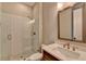 Modern bathroom features a glass shower, subway tile, and a quartz countertop vanity at 6585 Creekview Cir, Duluth, GA 30097
