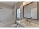 Bathroom featuring white subway tile, quartz countertop, and traditional fixtures at 6585 Creekview Cir, Duluth, GA 30097