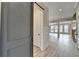 Inviting foyer with a sliding barn door and views of the bright and airy living spaces at 6585 Creekview Cir, Duluth, GA 30097