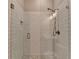 Walk in shower with a rainfall shower head and white subway tile surround at 6585 Creekview Cir, Duluth, GA 30097