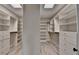 The walk-in closet features custom shelving and drawers at 6585 Creekview Cir, Duluth, GA 30097