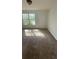 Bedroom with carpeted flooring and a window providing natural light at , Covington, GA 30016