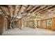 Unfinished basement space with exposed framing, ready for customization and personalization at 1604 Niskey Lake Sw Rd, Atlanta, GA 30331