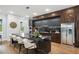 Modern kitchen features a large island, luxurious countertops, stainless steel appliances, and wood accents at 1604 Niskey Lake Sw Rd, Atlanta, GA 30331