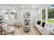 Comfortable living room with modern decor, a stylish rug, and plenty of natural light at 1604 Niskey Lake Sw Rd, Atlanta, GA 30331