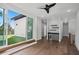 Bright living room with access to outdoor patio, featuring a modern bar with a wine cooler at 1604 Niskey Lake Sw Rd, Atlanta, GA 30331