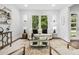 Cozy living room with modern decor, contemporary furnishings, and beautiful hardwood floors at 1604 Niskey Lake Sw Rd, Atlanta, GA 30331