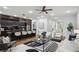 Spacious living room with an open kitchen, sleek decor, and great natural light at 1604 Niskey Lake Sw Rd, Atlanta, GA 30331