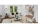 Stylish living room with contemporary furnishings, modern decor, and hardwood floors at 1604 Niskey Lake Sw Rd, Atlanta, GA 30331