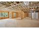 Unfinished basement with exposed framing and ample space for customization at 1610 Niskey Lake Sw Rd, Atlanta, GA 30331