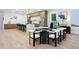 Open-concept dining area adjacent to kitchen, boasting modern furnishings and easy access to outdoor spaces at 1610 Niskey Lake Sw Rd, Atlanta, GA 30331