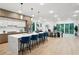 Stylish kitchen with an island, modern cabinets, stainless steel appliances, and seamless access to dining area at 1610 Niskey Lake Sw Rd, Atlanta, GA 30331