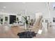 Spacious living area featuring hardwood floors, an open floor plan and modern decor, perfect for entertaining at 1610 Niskey Lake Sw Rd, Atlanta, GA 30331