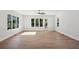 Bright living room with hardwood floors, large windows, and backyard views at 1610 Niskey Lake Sw Rd, Atlanta, GA 30331