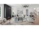Bright and airy living room with contemporary fireplace, recessed lighting, and stylish decor, perfect for entertaining at 1610 Niskey Lake Sw Rd, Atlanta, GA 30331