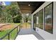 Modern porch with metal railings and views of the lawn at 1610 Niskey Lake Sw Rd, Atlanta, GA 30331
