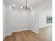 Bright room with hardwood floors and modern lighting fixture at 1610 Niskey Lake Sw Rd, Atlanta, GA 30331
