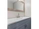 Bathroom features a single sink with a large framed mirror above at 3189 Bellgreen Way, Decatur, GA 30032
