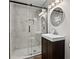 Modern bathroom featuring a walk-in shower and a stylish vanity at 3189 Bellgreen Way, Decatur, GA 30032