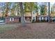 Charming home with a well-maintained front yard and mature trees at 3189 Bellgreen Way, Decatur, GA 30032