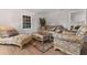 Comfortable living room with designer furnishings and natural light at 3189 Bellgreen Way, Decatur, GA 30032