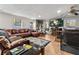 Spacious living room with hardwood floors, natural light, and cozy seating area at 3189 Bellgreen Way, Decatur, GA 30032