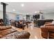 Spacious living room with wood floors, sofas, TV, and natural light at 3189 Bellgreen Way, Decatur, GA 30032