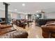 Large living room with hardwood floors, fireplace, and plenty of seating at 3189 Bellgreen Way, Decatur, GA 30032