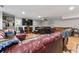 Living room features wood floors, sectional sofas, and a television at 3189 Bellgreen Way, Decatur, GA 30032