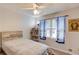 Cozy bedroom featuring a large window and natural light at 322 Kibbee Rd, Mcdonough, GA 30252