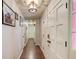 Long hallway features hardwood floors, neutral walls, and plenty of storage at 322 Kibbee Rd, Mcdonough, GA 30252