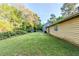 Expansive, well-maintained backyard featuring lush green grass and mature trees at 870 Chapman Cir, Stone Mountain, GA 30088