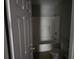 Compact bathroom featuring a shower-tub combo and a toilet, ready for updates at 1142 Windsor Sw St, Atlanta, GA 30310