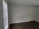 Well-lit bedroom with neutral walls, ready to be personalized into a cozy retreat at 1142 Windsor Sw St, Atlanta, GA 30310