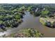 This aerial shows the neighborhood's access to the lake and surrounding lush landscapes at 2505 Weber Heights Way, Buford, GA 30519