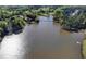 Stunning aerial view of the lake and pedestrian bridge at 2505 Weber Heights Way, Buford, GA 30519