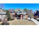 Elegant brick home with mature trees and landscaping, plus paved driveway at 2505 Weber Heights Way, Buford, GA 30519