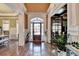 Elegant foyer with hardwood floors and ornate trim at 2505 Weber Heights Way, Buford, GA 30519