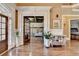 Grand foyer featuring hardwood floors and views of a living room at 2505 Weber Heights Way, Buford, GA 30519