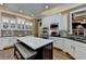 Expansive kitchen offering stainless steel appliances, granite countertops, a large island, and custom cabinetry at 2505 Weber Heights Way, Buford, GA 30519