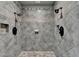 Walk-in shower featuring dual shower heads and tile surround at 2505 Weber Heights Way, Buford, GA 30519